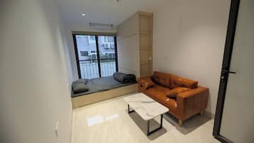 Appartement Deluxe, vue sur la ville | Aire de séjour