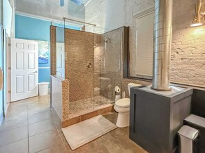 Shower, hair dryer, towels, shampoo