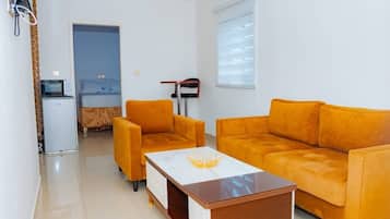 Studio Confort, balcon | Coin séjour