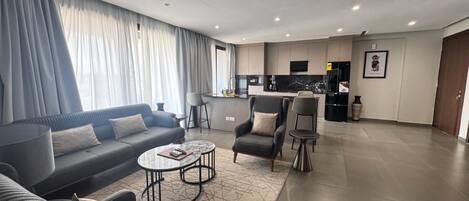 Superior Condo, Balcony, City View | Living area