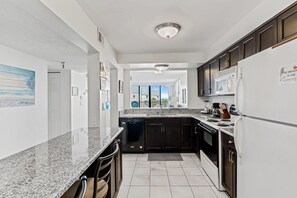 Fridge, microwave, oven, stovetop - Gulf Glimpse Getaway • Pool • Steps to Beach (Indian Shores)