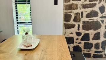 Superior Chalet, Patio, Garden View | Dining | Breakfast, lunch and brunch served