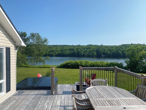 Quiet Waterfront Cottage w/ Hot Tub, River View & Access only 2 min to Boat Ramp