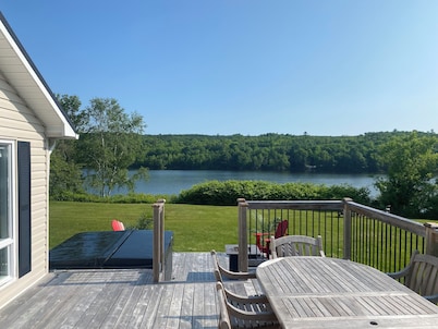 Quiet Waterfront Cottage w/ Hot Tub, River View & Access only 2 min to Boat Ramp