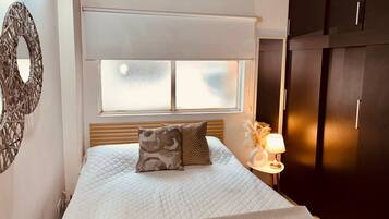 4 bedrooms, desk, iron/ironing board, travel cot