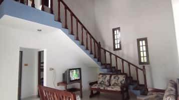 Casa família, varanda coberta, vista para a praia | Parte interna