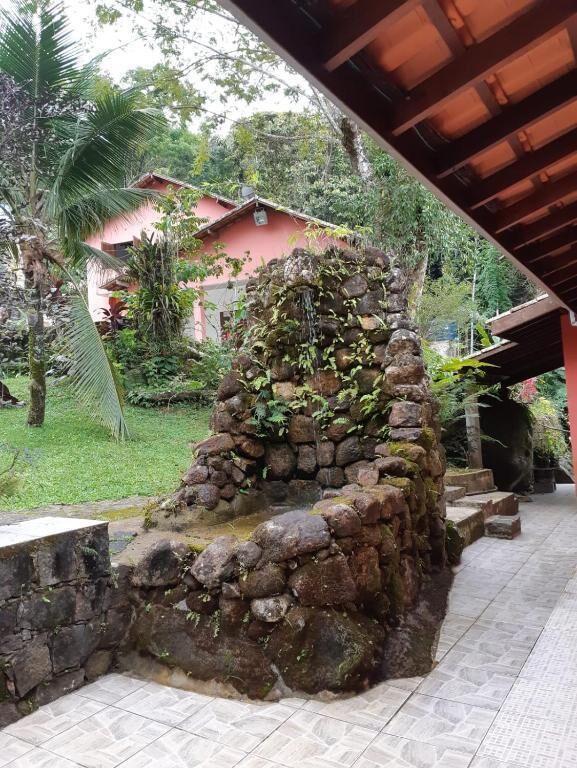 Suíte, sacada, vista para o pátio | Área da propriedade