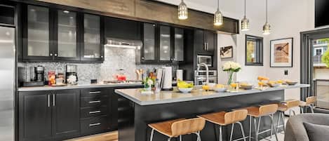 Coffee/tea maker, fridge, microwave, oven