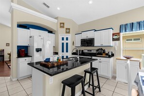 Fridge, microwave, oven, stovetop - Beautiful Glenbrook Pool Home with 4 Bedrooms & 3 Bathrooms (Clermont)