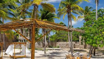 Outdoor pool, open 8:00 AM to 8:00 PM, free cabanas, pool umbrellas