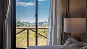 Cabaña, vista al jardín | Área de sala de estar