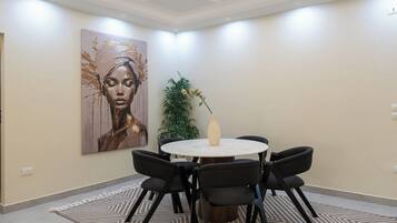 Deluxe Apartment, 3 Bedrooms, Balcony, City View | Dining