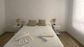 3 habitaciones, tabla de planchar con plancha y wifi