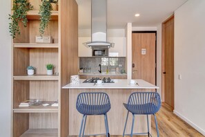 Fridge, microwave, oven, stovetop - w* |  Stylish & Cozy Duplex Loft in Zona G (Bogotá)