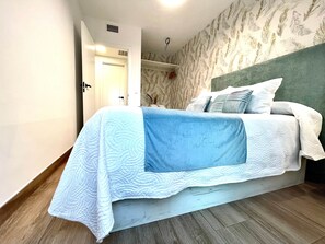 2 dormitorios, tabla de planchar con plancha, wifi y ropa de cama