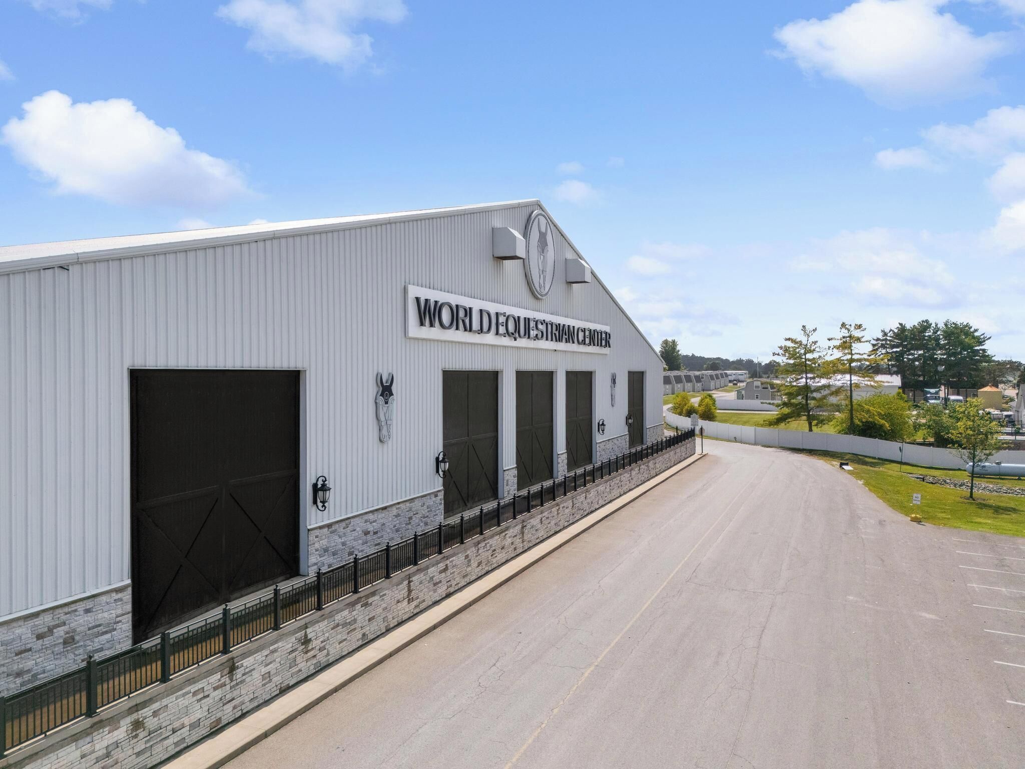 A large industrial building with a sign reading 'WORLDQUESTRAN CENTER'.