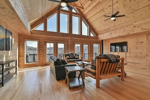 TV, fireplace - Luxury Log Cabin with Hot Tub, Game Room & Theater and Mountain Views (Black Mountain)