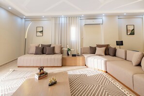 Deluxe Apartment, 2 Bedrooms, Balcony | Living area - Beithady Luxury Aparthotel Lotus - BH-73 (New Cairo)
