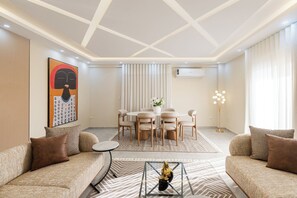 Deluxe Apartment, 4 Bedrooms, Balcony, City View | Dining - Beithady Luxury Aparthotel Lotus - BH-73 (New Cairo)