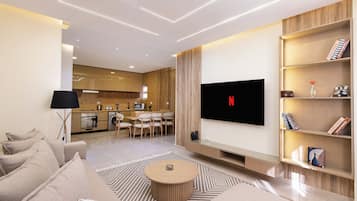 Deluxe Apartment, 2 Bedrooms, Balcony, City View | Living area