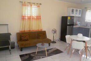 Living area - Welcome to our bright, air-conditioned 1BR apt in sunny Willemstad! nearby shops (Willemstad)