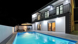 A modern two-story house with a swimming pool, outdoor seating, and a balcony. - Adriatic Villa Privlaka - Two bedroom Villa with pool (Privlaka)