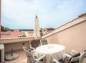 Outdoor dining - Apartments Macolić Rab - Two Bedroom Apartment With Terrace (B2) (Rab)