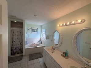 Jetted tub, hair dryer, towels, soap