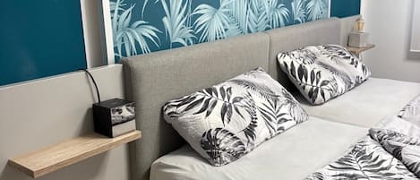 2 habitaciones, tabla de planchar con plancha, wifi y ropa de cama