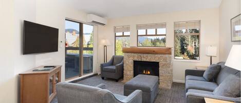 Gather by the cozy fireplace and soak in mountain views.