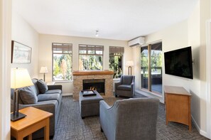 TV, fireplace - Hideaway 2BR + Loft w/ Fully Equipped Kitchen & Fireplace near Village Buzz (Whistler)