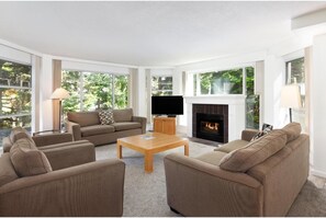 TV, fireplace - Comfortable Private Condo Retreat Perfect for Exploring Whistler’s Wilderness (Squamish-Lillooet)