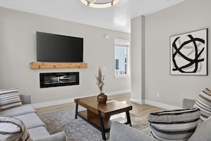 TV, fireplace - Nampa`s New Nest - The Orion (Nampa)