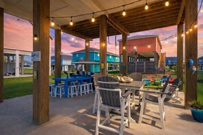 Outdoor dining - Cozy 3BR Retreat Near Beach | Sleeps 7 | Deck + Fire Pit (Galveston)