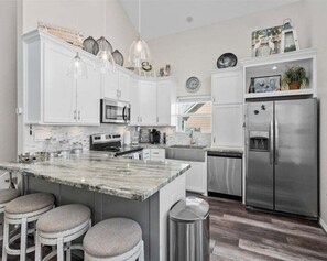 Fridge, microwave, oven, stovetop - Cozy 3BR Retreat Near Beach | Sleeps 7 | Deck + Fire Pit (Galveston)