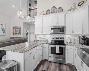Fridge, microwave, oven, stovetop - Cozy 3BR Retreat Near Beach | Sleeps 7 | Deck + Fire Pit (Galveston)