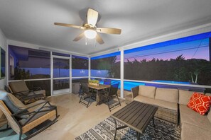 Outdoor dining - New! Gulf Breeze - Stunning Heated Saltwater Pool & Spa with Sundeck, Apprx 1 Mile to Beach! (Naples)