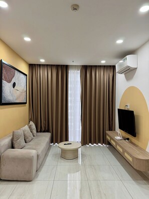 Deluxe Apartment, 1 Bedroom, Balcony, City View | Living area