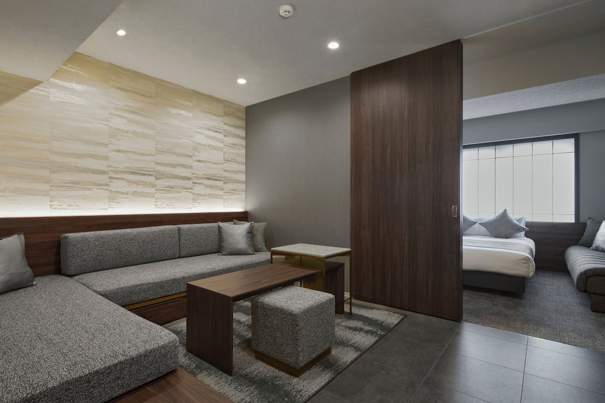 1 Bedroom Premium Suite, Non Smoking | Living area | Flat-screen TV