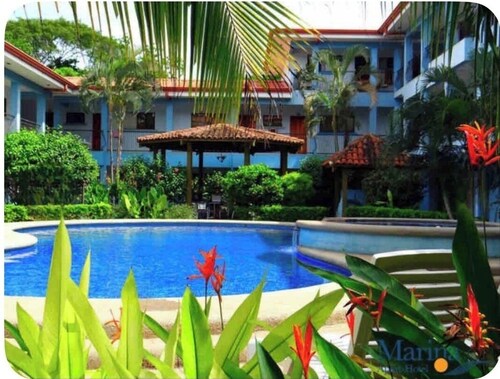 Cozy 1-bedroom apartment in Playas Del Coco with AC,  pool and hot shower
