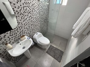 Shower, hair dryer, towels, toilet paper - First floor  2-bedroom apartment with AC in vibrant Moca (Moca)