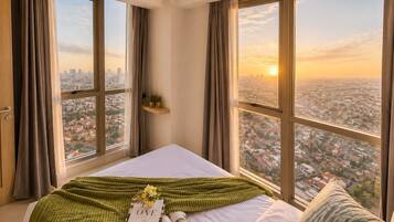 Apartment, 2 Bedrooms, City View | Desk, iron/ironing board, free WiFi
