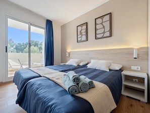 1 dormitorio, tabla de planchar con plancha, Internet y ropa de cama