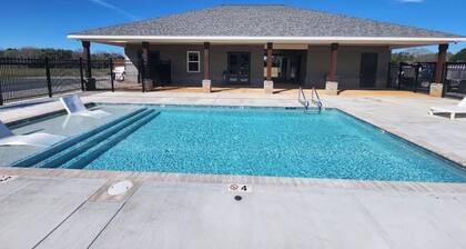 fully set up camper, located at Homestead RV Community resort