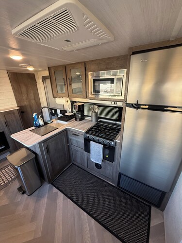 fully set up camper ready to go, located at Homestead RV Community park