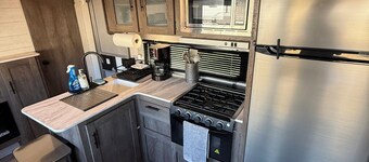 fully set up camper ready to go, located at Homestead RV Community park