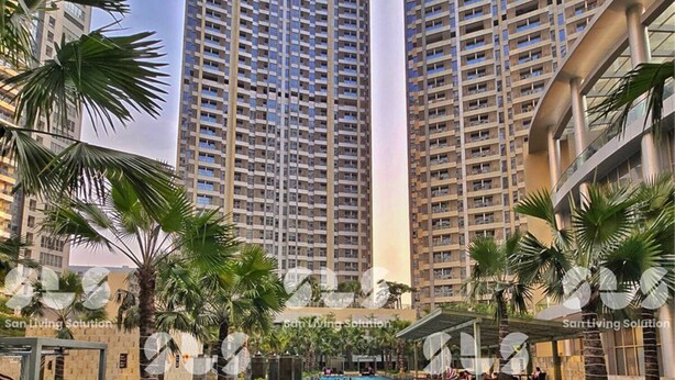 A swimming pool area with high-rise buildings in the background. - Arlo By SanLiving - 2BR - HubLife Mall (Jakarta)