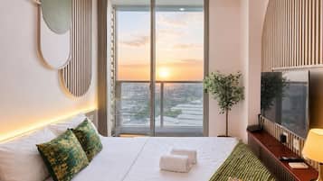 Apartemen, 2 kamar tidur, pemandangan kota | Meja kerja, setrika/meja setrika, dan Wi-Fi gratis