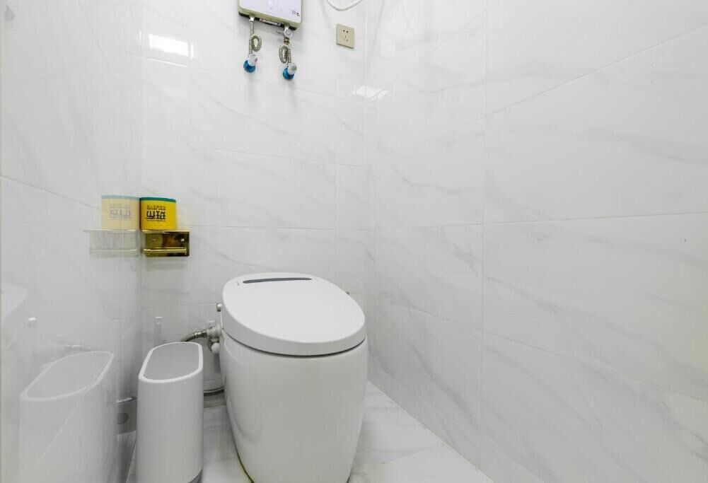 Comfort appartement, 2 slaapkamers, uitzicht op tuin | Badkamer | Een haardroger, pantoffels, handdoeken, shampoo
