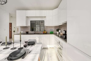 Fridge, microwave, oven, stovetop - Lumina Family Apartment patio with private garden (New apartment)
